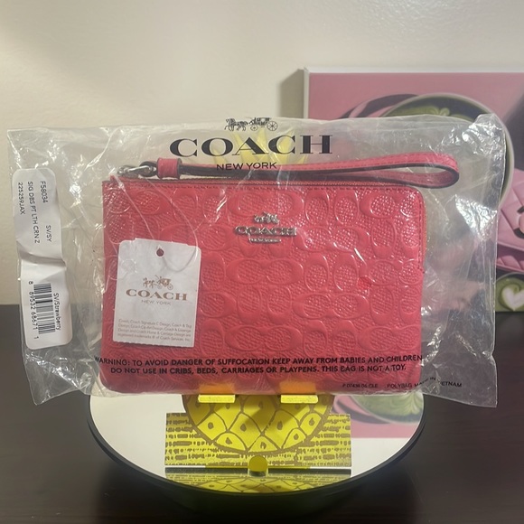 NWT Coach Wristlet raised C’s in strawberry color - Picture 2 of 7